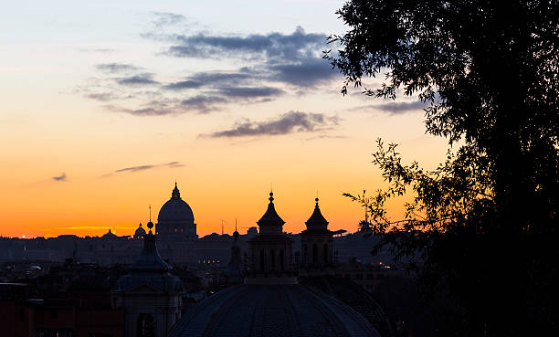 istock Cityscape with church cupolas at sunset, Rome Italy 529952671