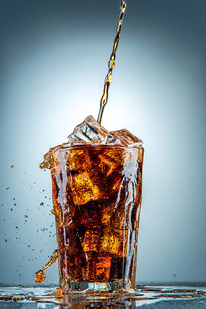 istock Cola pouring in a glass 529953755