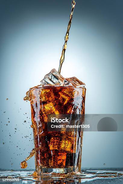 Cola Pouring In A Glass Stock Photo - Download Image Now - Soda, Cola, Drink