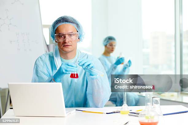 Serious Chemist Stock Photo - Download Image Now - Adult, Analyzing, Biochemistry