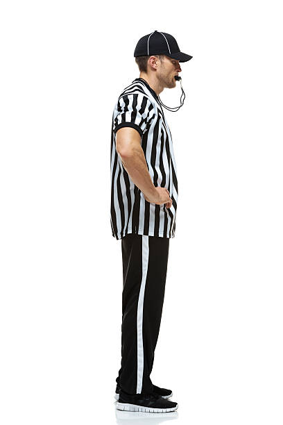 istock Football referee whistling 529962897