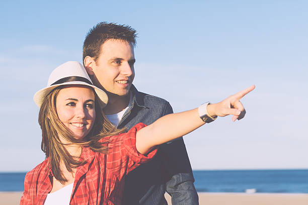 istock Couple in love with beach background 529965897