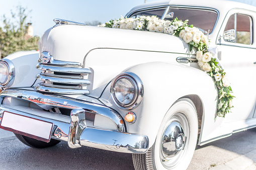 Vintage Wedding Car Decorated with Flowers