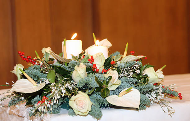 istock bouquet with calla lilies, white flowers and Holly 529968087