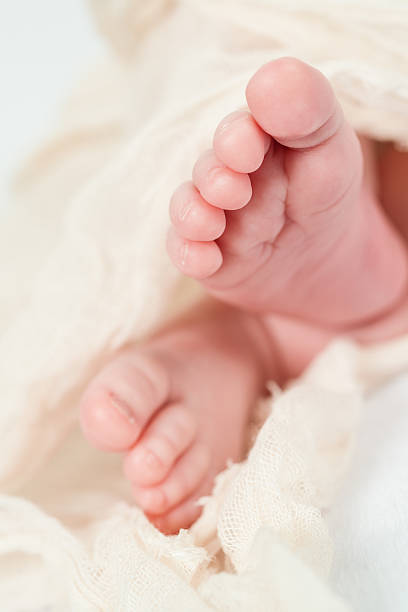 istock Newborn Baby Toes 529968593