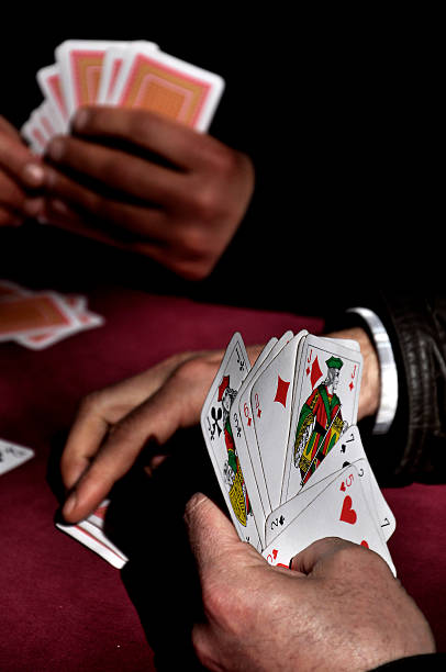 zakłady i gry karciane - bridge cards playing leisure games zdjęcia i obrazy z banku zdjęć