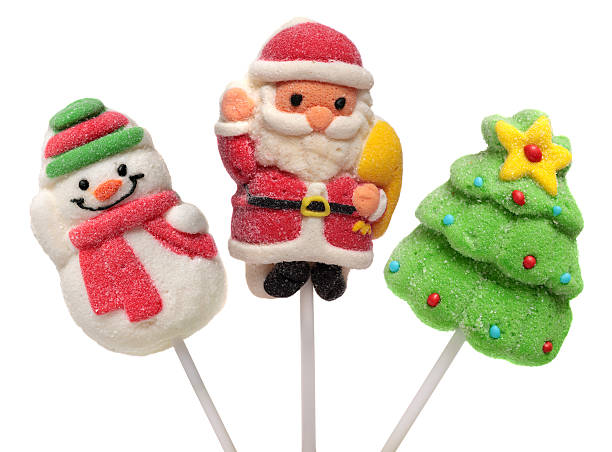 istock Three  new year sweets . Christmas tree, Santa Claus and Snowman. 529976775