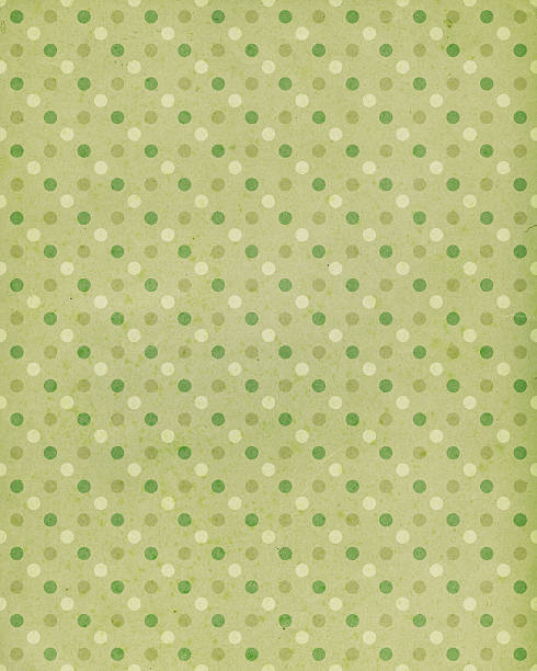 istock light green paper with polka dots 529977655