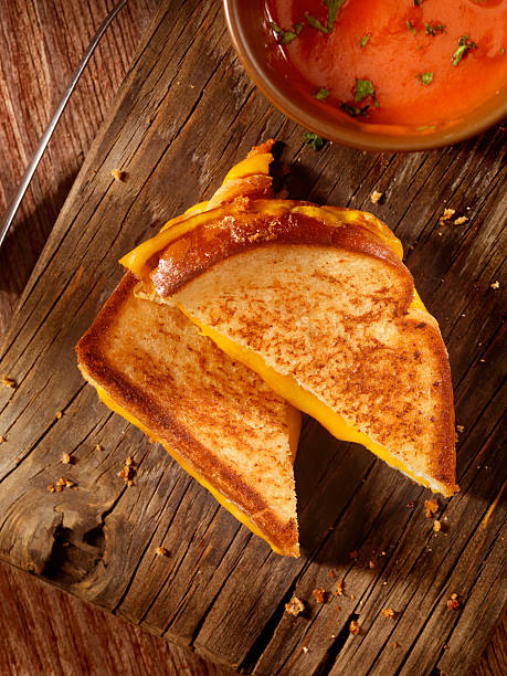 istock Grilled Cheddar Cheese Sandwich with Tomato Soup 529977740