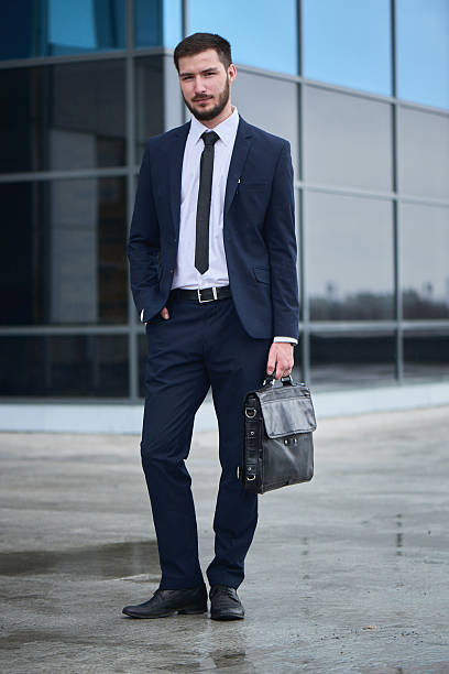 istock Portrait of a guy in a suit with a briefcase 529977882