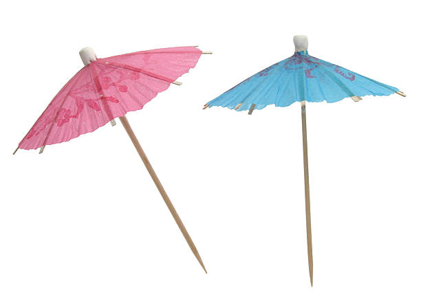 Cocktail umbrellas made of paper Cocktailschirmchen drink umbrella stock pictures, royalty-free photos & images