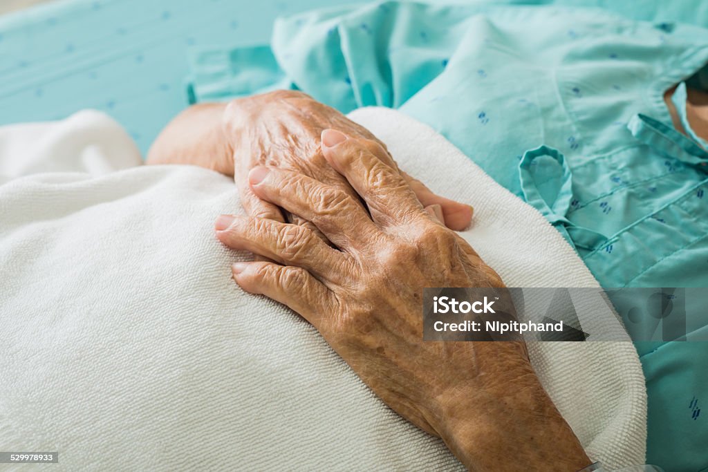 Hand of Elderly patient sleeping on bed in hospital Close up hand of Elderly patient sleeping on bed in hospital 80-89 Years Stock Photo