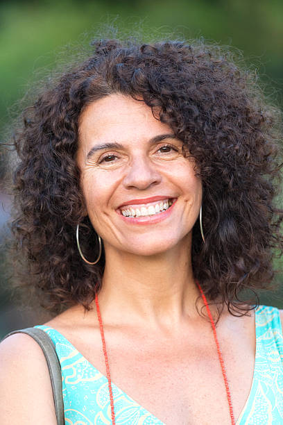istock Smiling mature hispanic woman 529983801