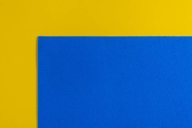 istock Eva foam blue on smooth lemon yellow 529988194