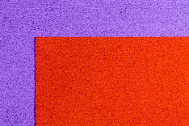 istock Eva foam orange on light purple 529991674