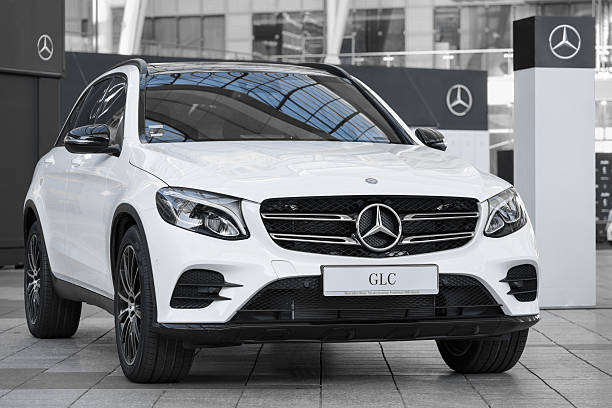 Modern model of prestigious Mercedes-Benz GLC-class SUV crossove Munich, Germany - May 6, 2016: Modern model of prestigious Mercedes-Benz GLC-class SUV crossover. Selective color outdoor stock photo was captured in a public place with free access. isolated colour stock pictures, royalty-free photos & images