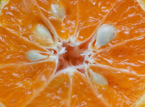 sliced mandarin fruit close up top view