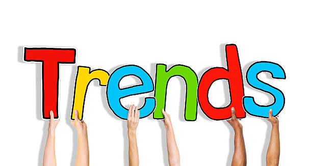 istock Diverse Hands Holding the Word Trends 529993555
