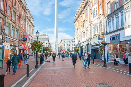 Dublin, Ireland - Sep 27, 2014: People at Talbot Street with Spire at background in Dublin, Ireland on September 27, 2014