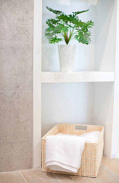 istock white towel in basket with artificial little tree for decoration 529994809