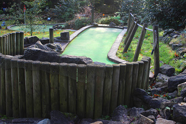 istock Image of miniature golf course (crazy golf), putting greens / flags 529994833