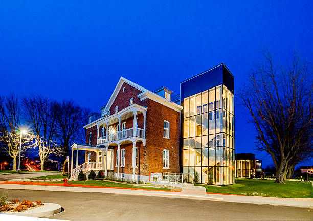 Night architecture Saint-Hyacinthe, Canada - May 9, 2016: Insurance Humania cultural center of the city of St-Hyacinthe. Complete renovation of the farmhouse into a cultural center. Located in St-Hyacinthe, in the Montérégie region, province of Quebec. View of the entire building . saint hyacinthe photos stock pictures, royalty-free photos & images