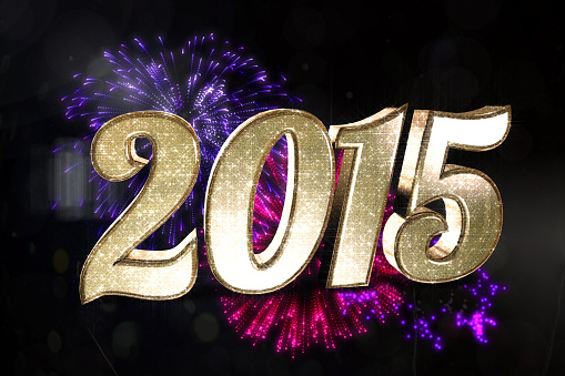 Sparkly 2015 against colourful fireworks exploding on black background