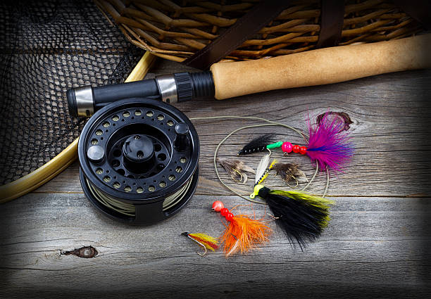 istock Fishing Gear on Rustic Wood with vignette 529996625