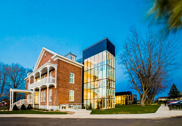 Humania Insurance Cultural Centre Saint-Hyacinthe, Canada- May 9, 2016: Insurance Humania cultural center of the city of St-Hyacinthe. Complete renovation of the farmhouse into a cultural center. Located in St-Hyacinthe, in the Montérégie region, province of Quebec. View of the main entrance.  saint hyacinthe photos stock pictures, royalty-free photos & images