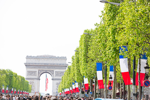 Celebration on Champs-Elysées and Arc de Triomphe in Paris. The street is closed for vehicles