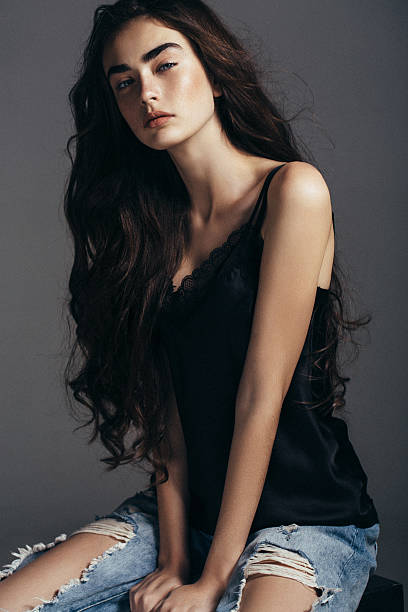 istock Beautiful girl sitting at the studio 529999136