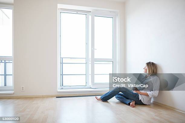 Young Woman In Her New Apartment Stock Photo - Download Image Now - Apartment, Empty, Women