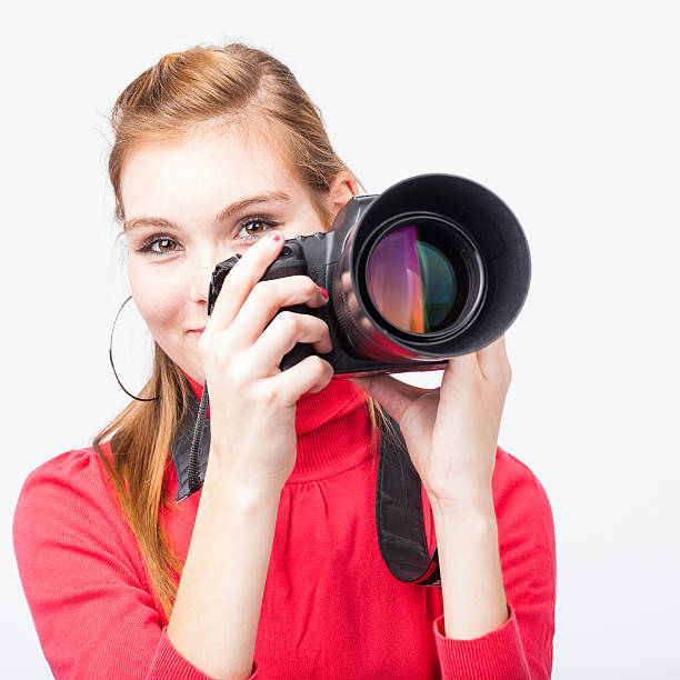 istock Pretty, female photographer 530002786