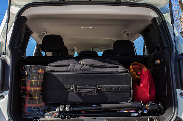 istock Luggage packed in cargo hold of SUV 530003554