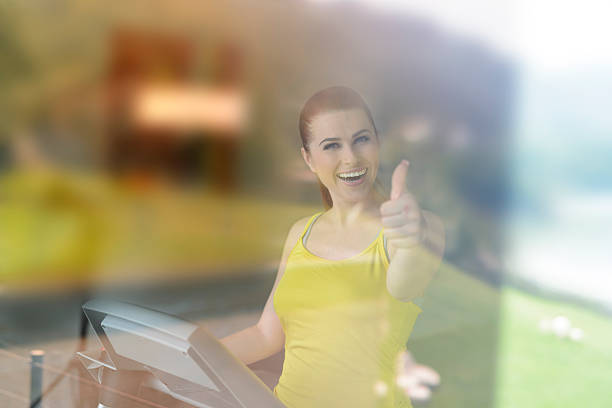 happy red hair woman showing thumbs up for healthy lifestyle.