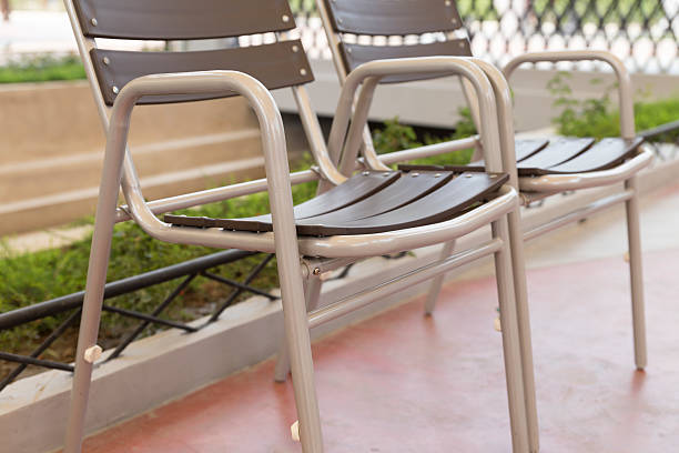 istock brown plastic chair in the park 530004804
