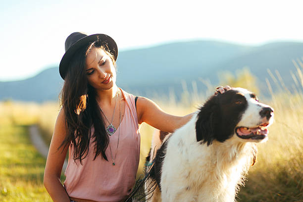 istock Young woman and her shepherd dog 530005199