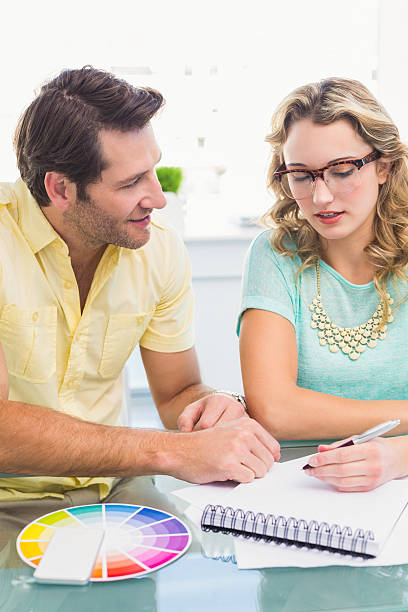 istock Creative business team working together at desk 530006253