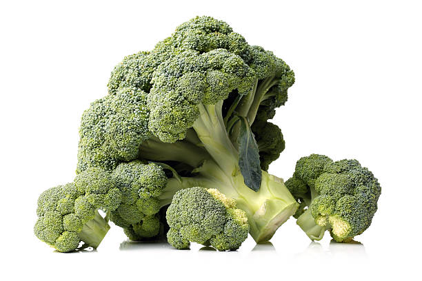 fresh broccoli fresh broccoli on white background broccoli crowns stock pictures, royalty-free photos & images