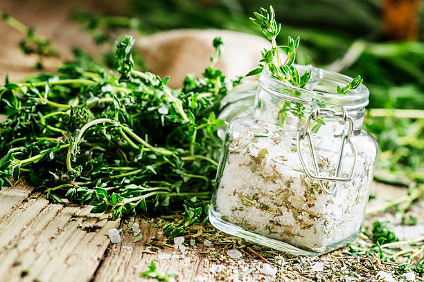 istock Traditional spicy salt with thyme in a glass jar 530007162