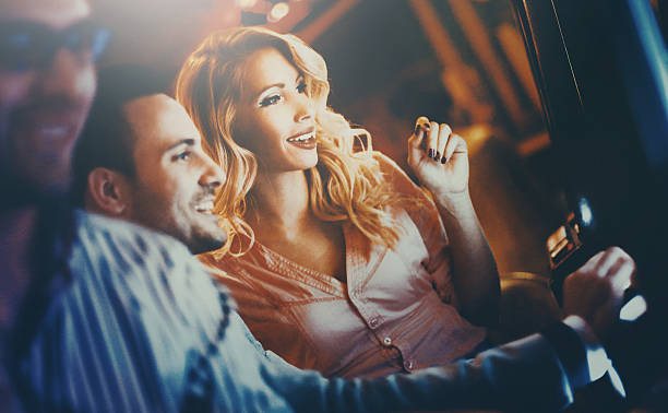 istock Group of people playing slots. 530007542