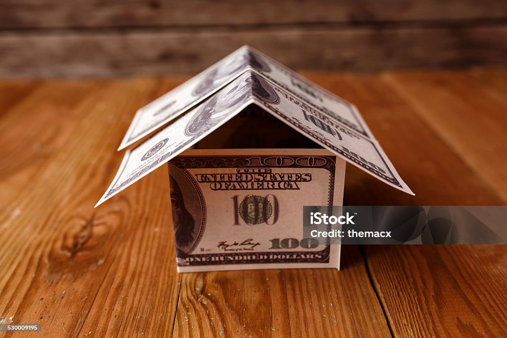 Money House on Wood Money House on Wood. Business Stock Photo