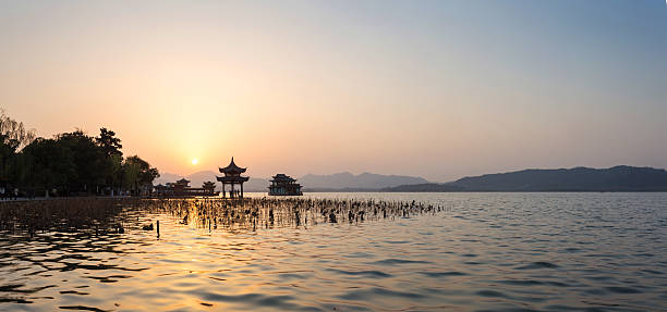 istock panoramic waterscape of west lake during sunset 530009549