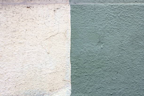 istock closeup of two colors plaster on wall 530009571