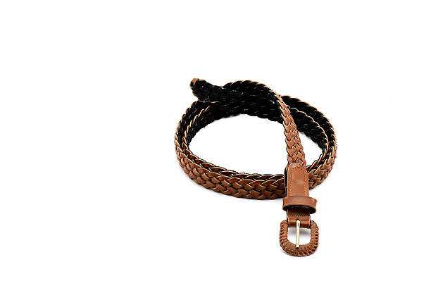 istock Handmade leather belts Isolated on white background 530009898