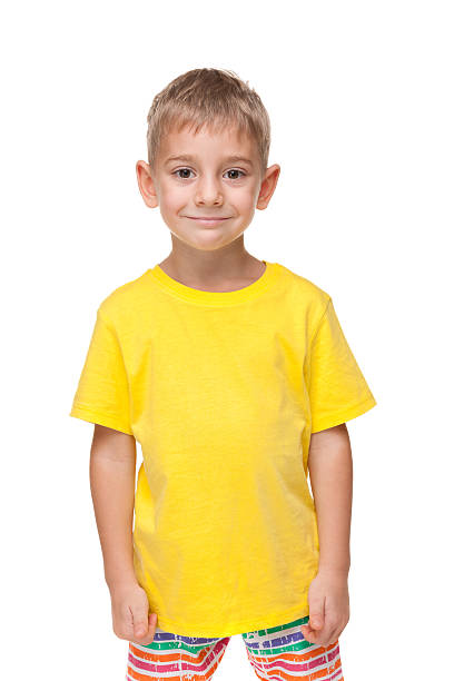 istock Cute little boy in a yellow shirt 530047971