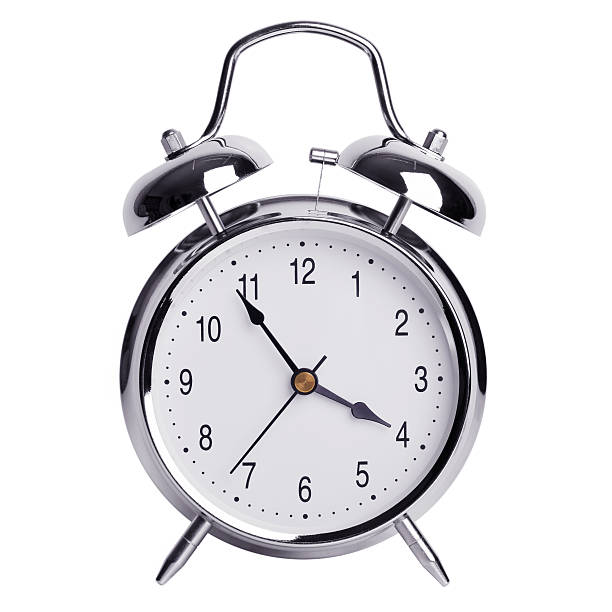 istock Five minutes to four on an alarm clock 530049409