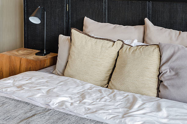 istock bedroom with black modern lamp 530050633