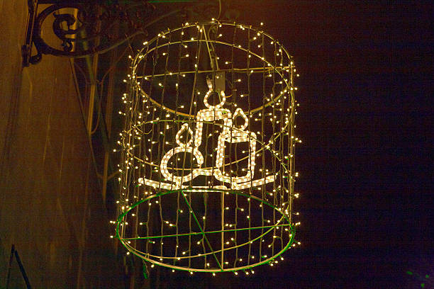 Decoration on wall with christmas candles and electric lights