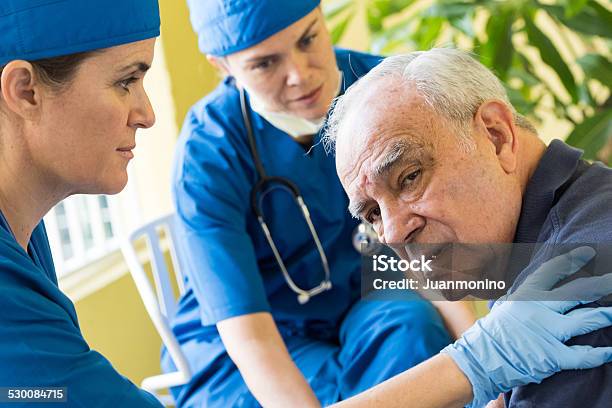 Home Healthcare Stock Photo - Download Image Now - Home Caregiver, Urgency, Distraught